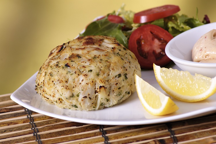 "Sweet lumps of Atlantic crab surrounded by all natural ingredients - it's no wonder these full quarter pound crab cakes are a customer favorite! Made from the classic recipe, this quarter pound crab cake is crafted by hand using 100% domestic US blue crab meat. No imported crab meat. We add only as much filler as necessary to hold the lumps together and insist on premium ingredients at every turn. These are the real deal, not ""Maryland style"" or ""Maryland recipe"" but true, legendary, 100% Maryland crab cakes."
