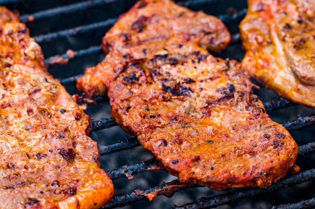 pork shoulder steaks on the grill
