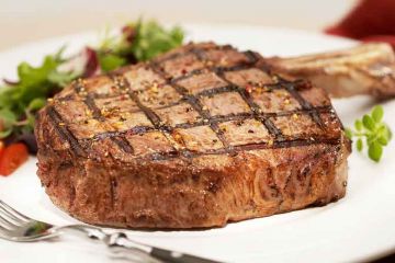 wet aged bone-in ribeye steak