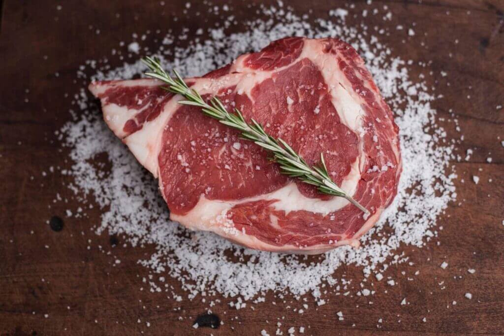 seasoned steak ready to cook