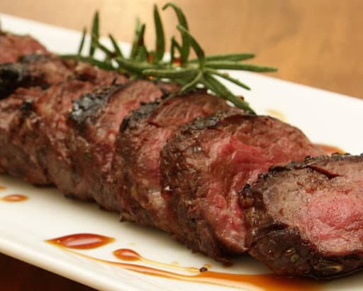 cooked skirt steak served on platter