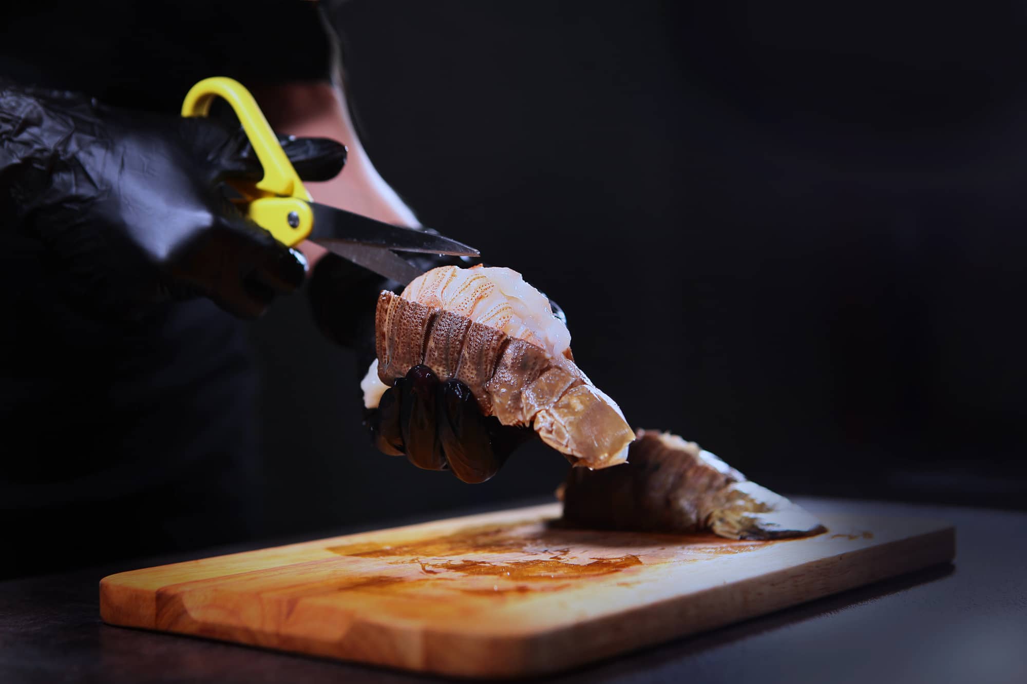 cutting a lobster tail