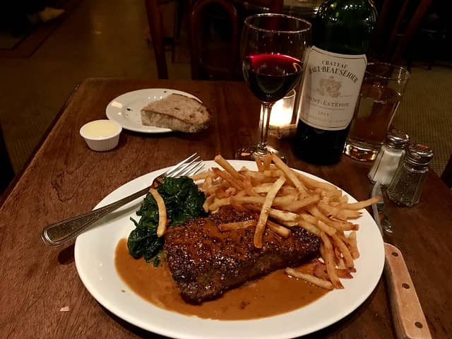 ribeye steak meal with red wine