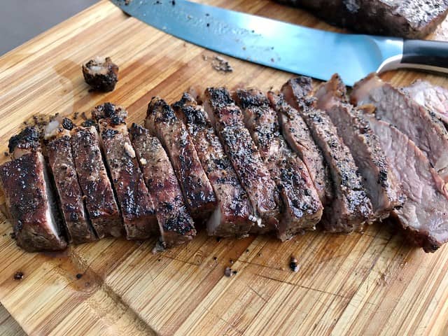 smoked porterhouse steak cooked and sliced
