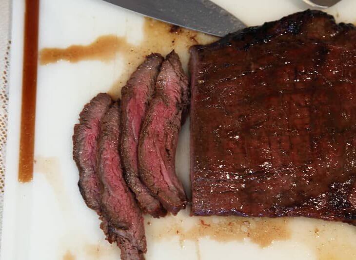 flank steak in a red wine marinade sliced