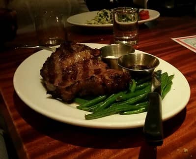 prime rib with green beans and sauce