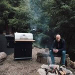 man camping making prime rib on pellet grill