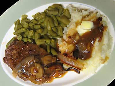 hamburger steak with mushroom gravy green beans and mashed potatoes