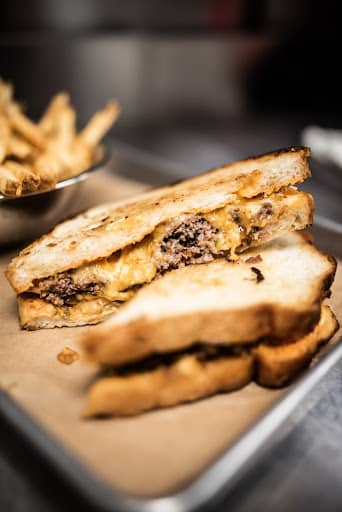 cube steak sandwich served with french fries