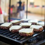 hamburger steak on the grill with cheese