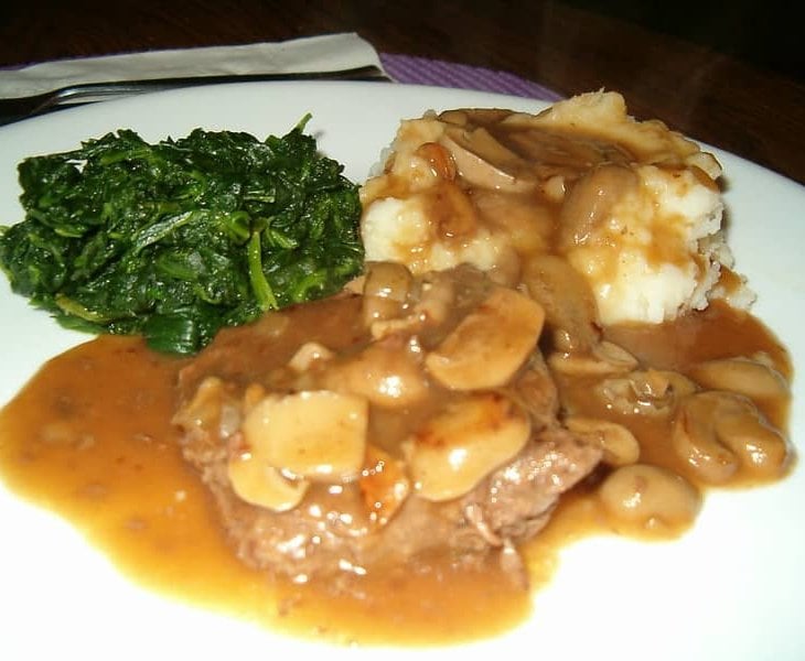 cube steak with cream of mushroom soup and gravy with mashed potatoes