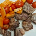 cube steak cooked and served with vegetables