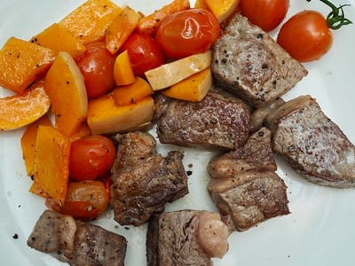 cube steak cooked and served with vegetables
