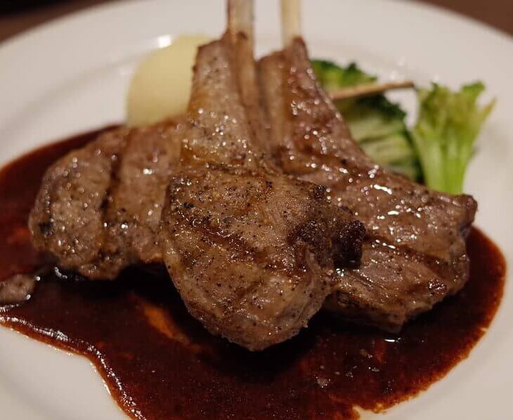 cooked lamb steaks served and ready to eat