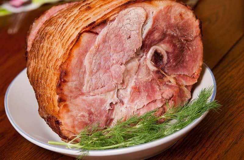 cooked and sliced ham ready to eat. 
