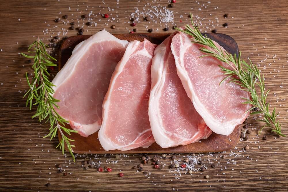 brined pork chops ready to cook