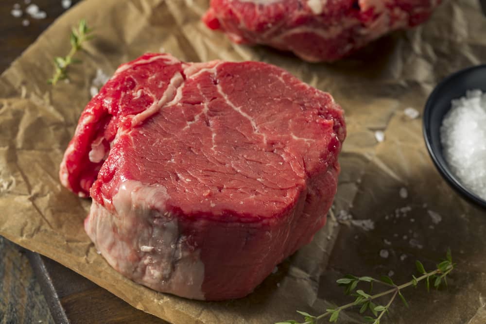 perfect cut of raw filet mignon for broiling