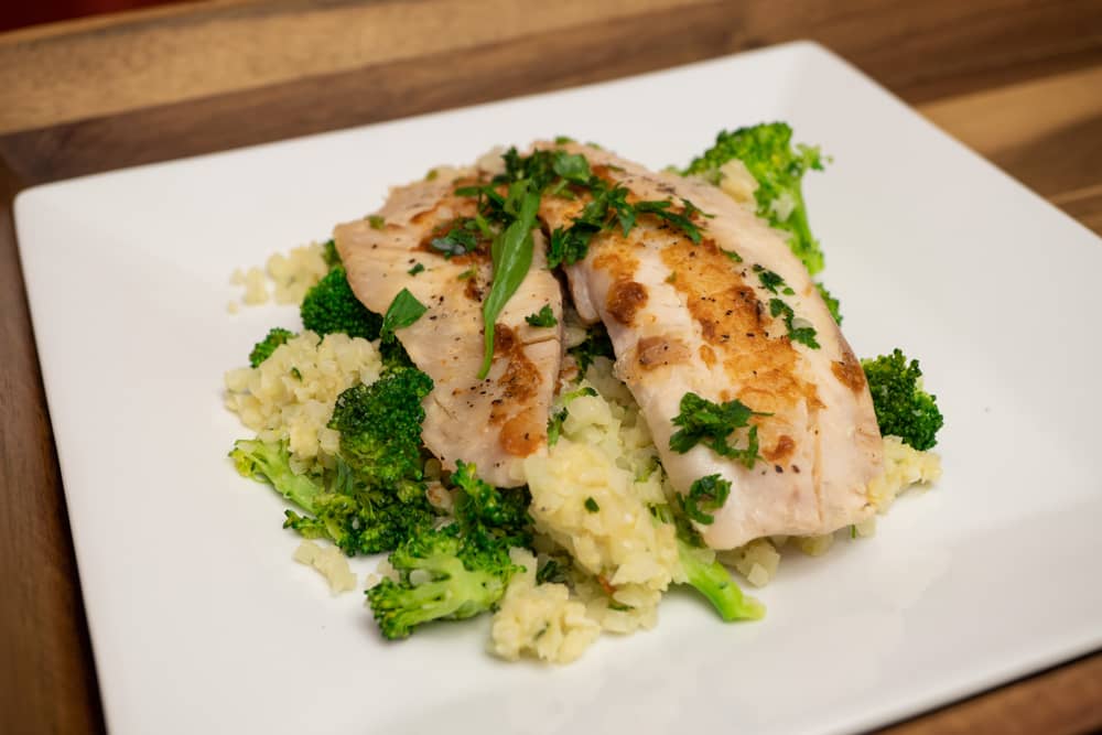 tilapia with steamed rice and broccoli