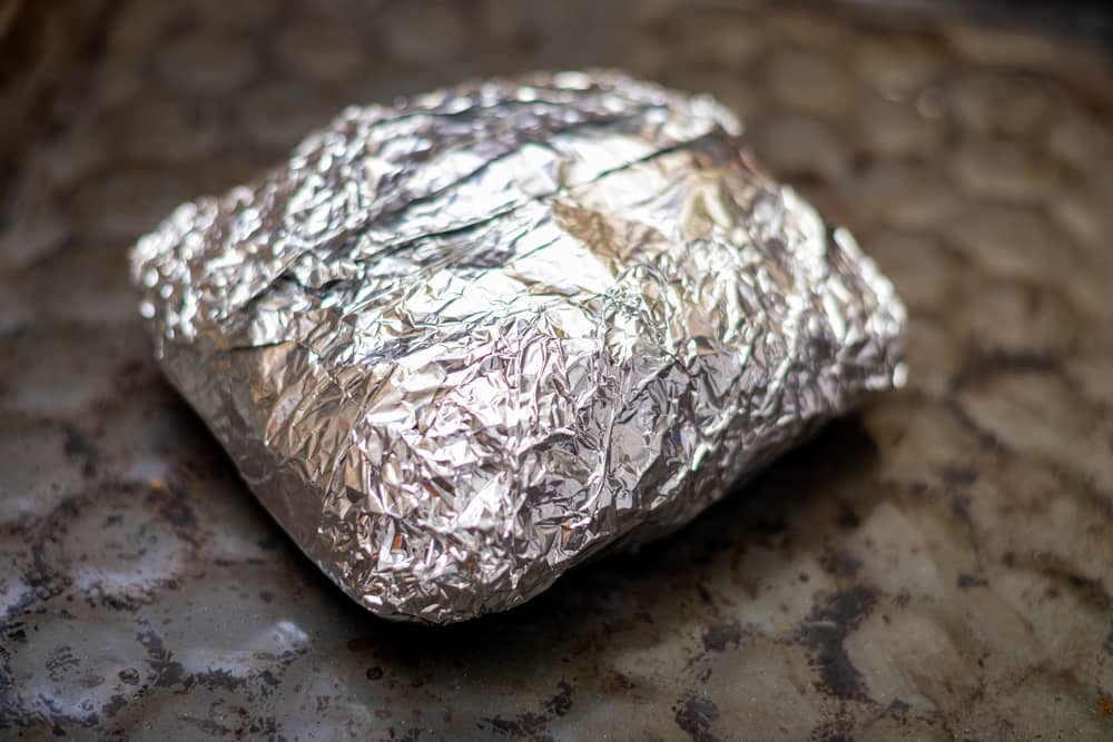 pork belly wrapped in tin foil