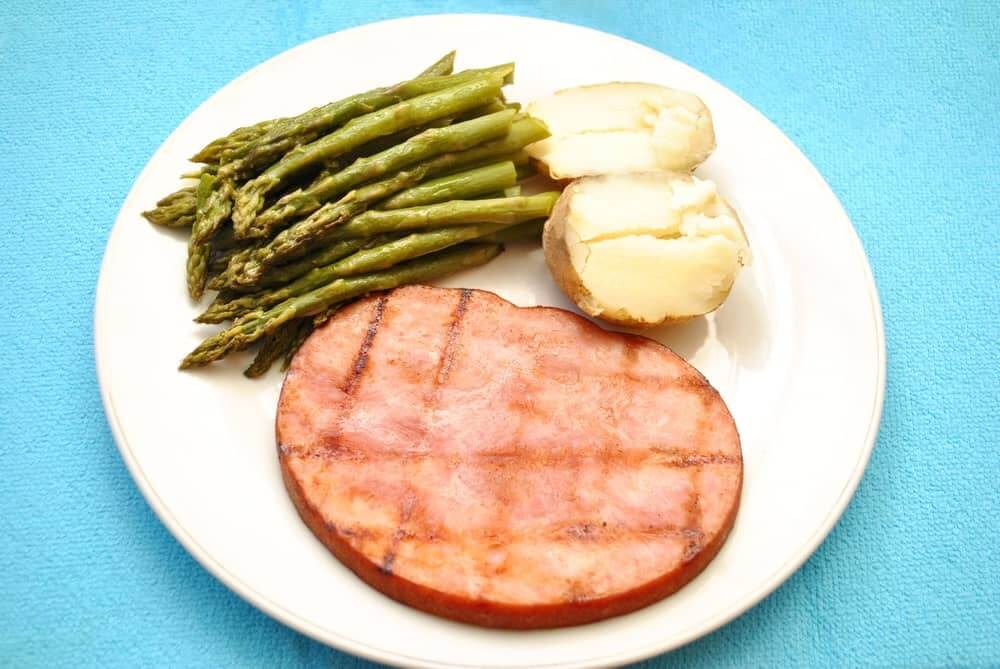 asparagus and mashed potato side dishes with ham steak