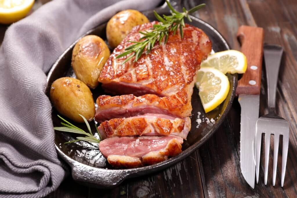 roasted duck breast with potatoes and lemon