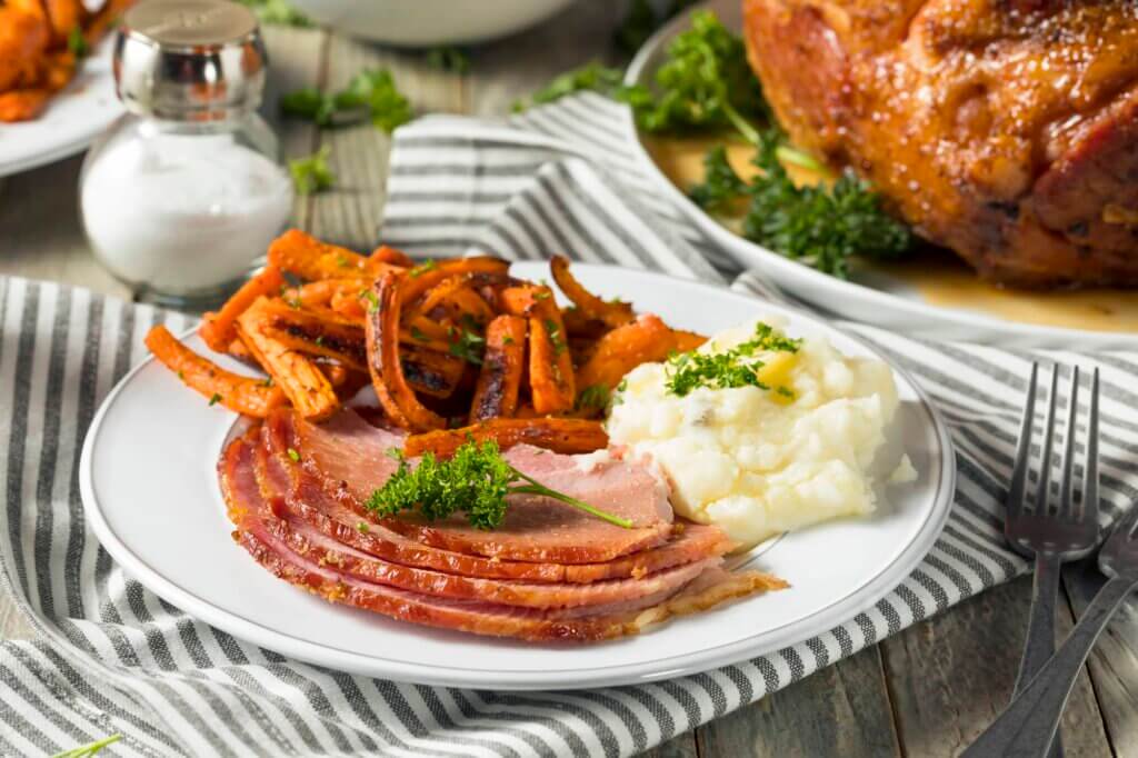 spiral ham with mashed potatoes and sweet potato fries