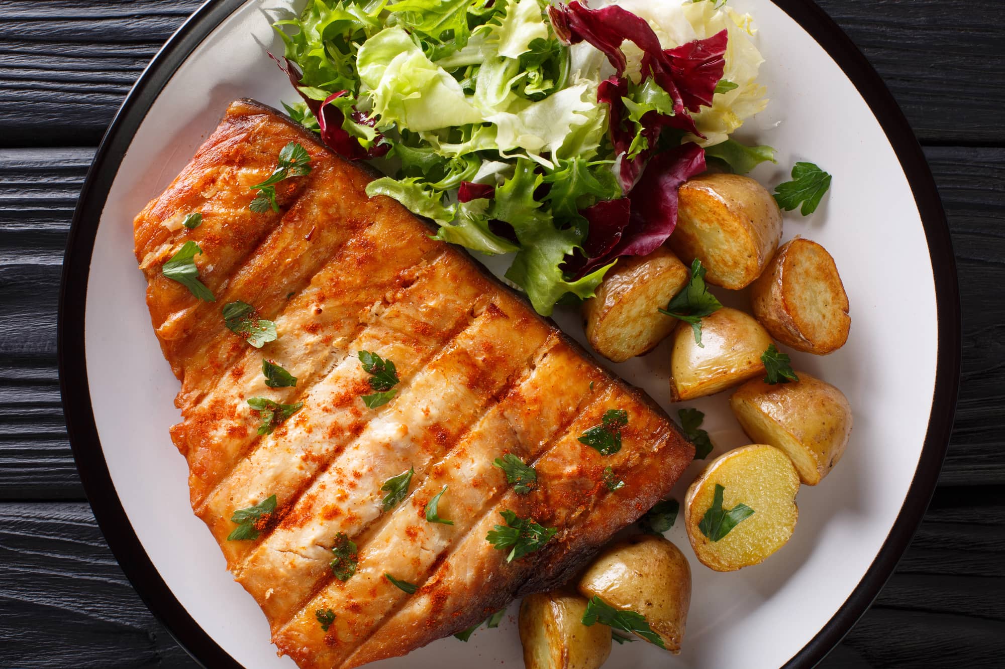 grilled swordfish with potatoes and salad