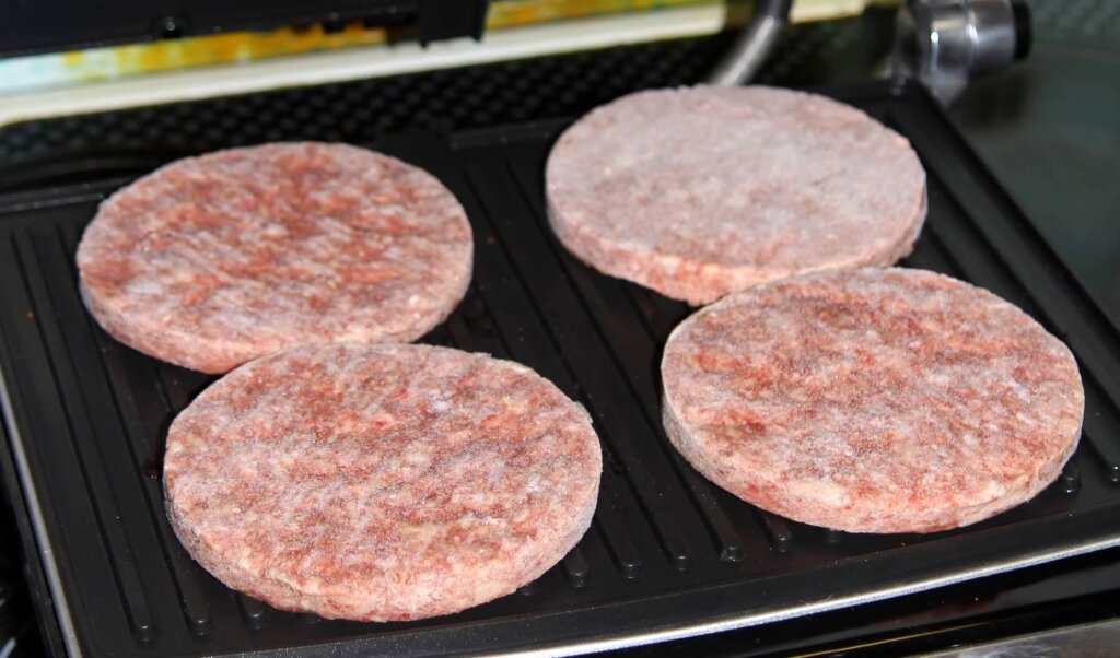 cooking frozen burgers on the grill