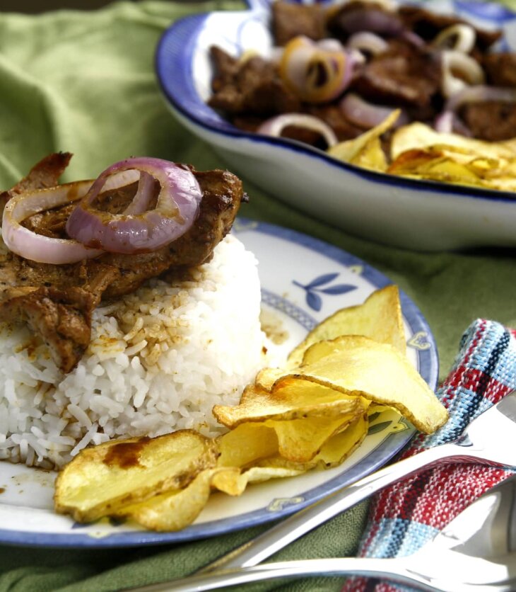 bistek with rice and potato fries