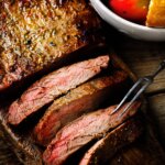 flank steak cooked on the blackstone griddle