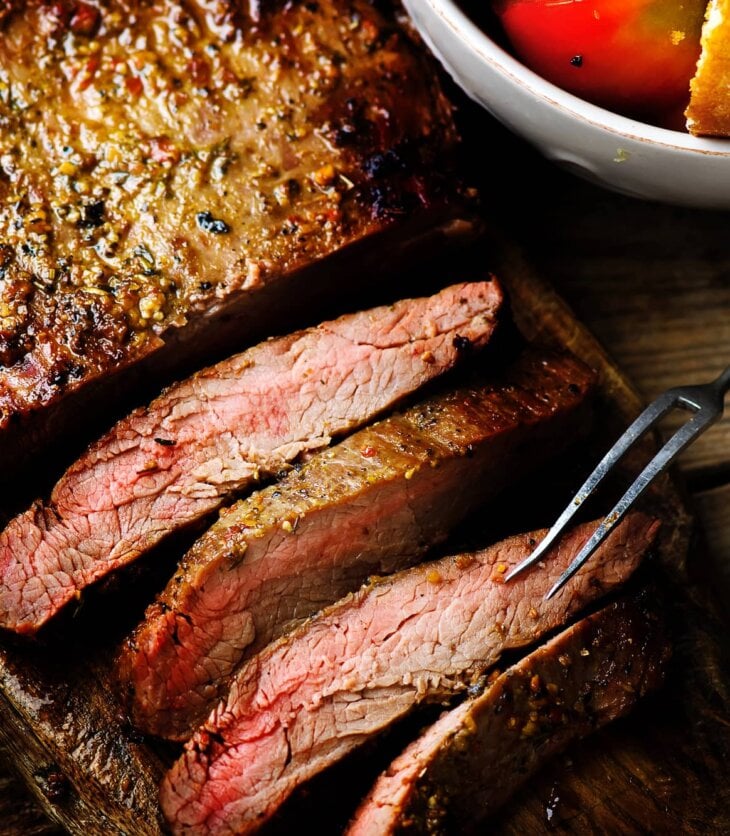 flank steak cooked on the blackstone griddle